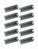 Набор шильдиков матовых из нержавеющей стали AISI304, размер 25х8х0,8 мм с гравировкой HAND MADE (10 шт.)